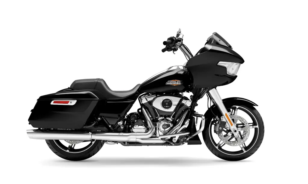 2026 Harley-Davidson Road Glide in Vivid Black, right side, studio shot, frame-mounted sharknose fairing, low tinted screen and hard saddlebags