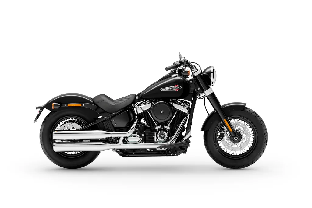 Right-side studio view of a black 2021 Harley-Davidson Softail Slim, with a solo seat, laced wheels and chrome exhaust.