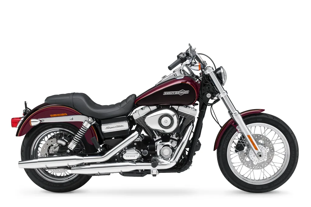 Right-side studio view of a burgundy 2014 Harley-Davidson Super Glide Custom, with laced wheels, two-up seat and chrome exhaust.