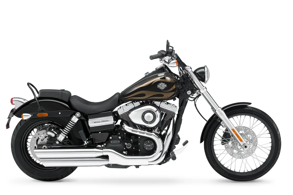 Right-side studio view of a black 2017 Harley-Davidson Wide Glide, with flame tank graphics, raked forks and a small passenger backrest.